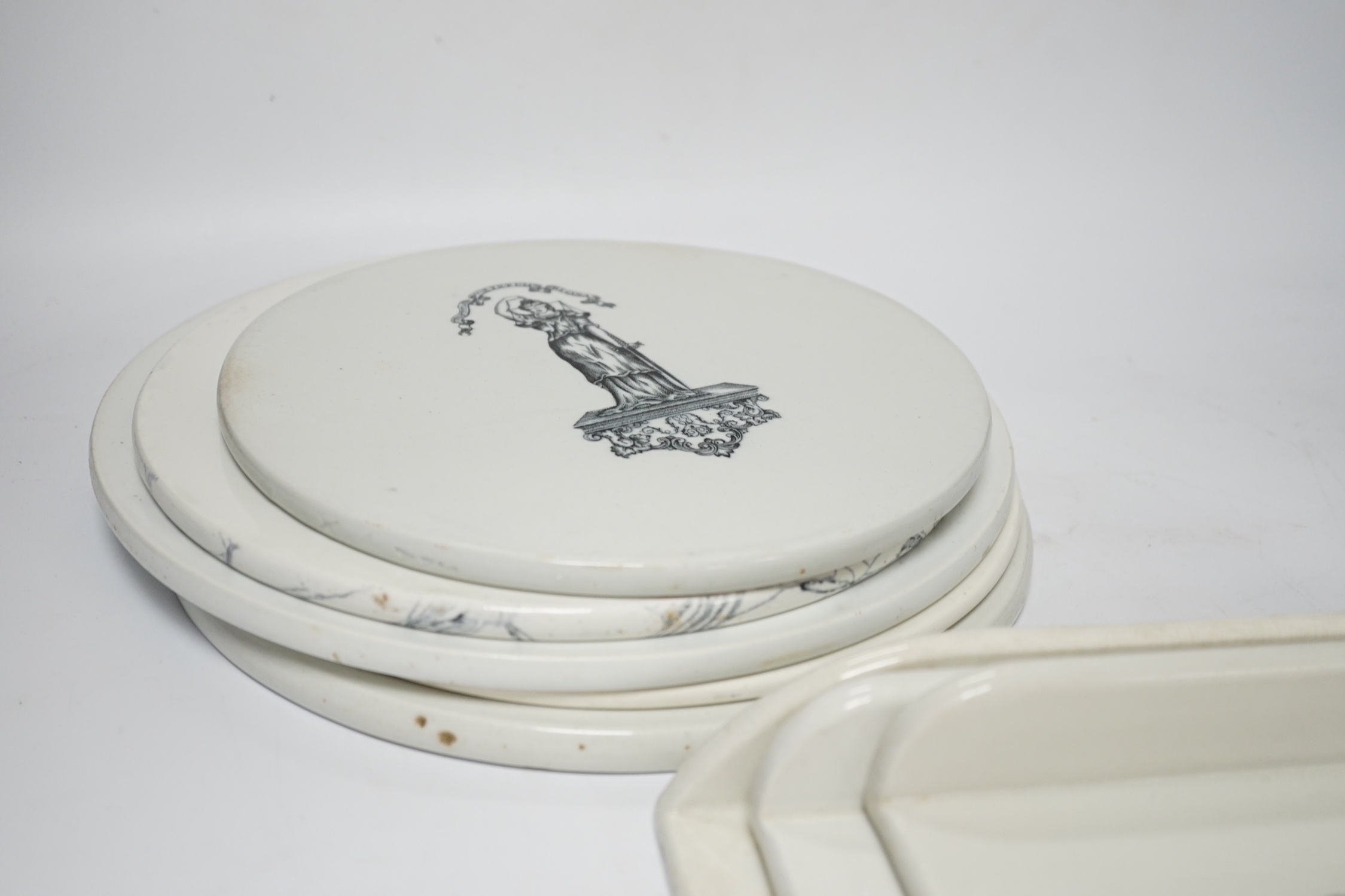 A group of eight Victorian ceramic scale platters